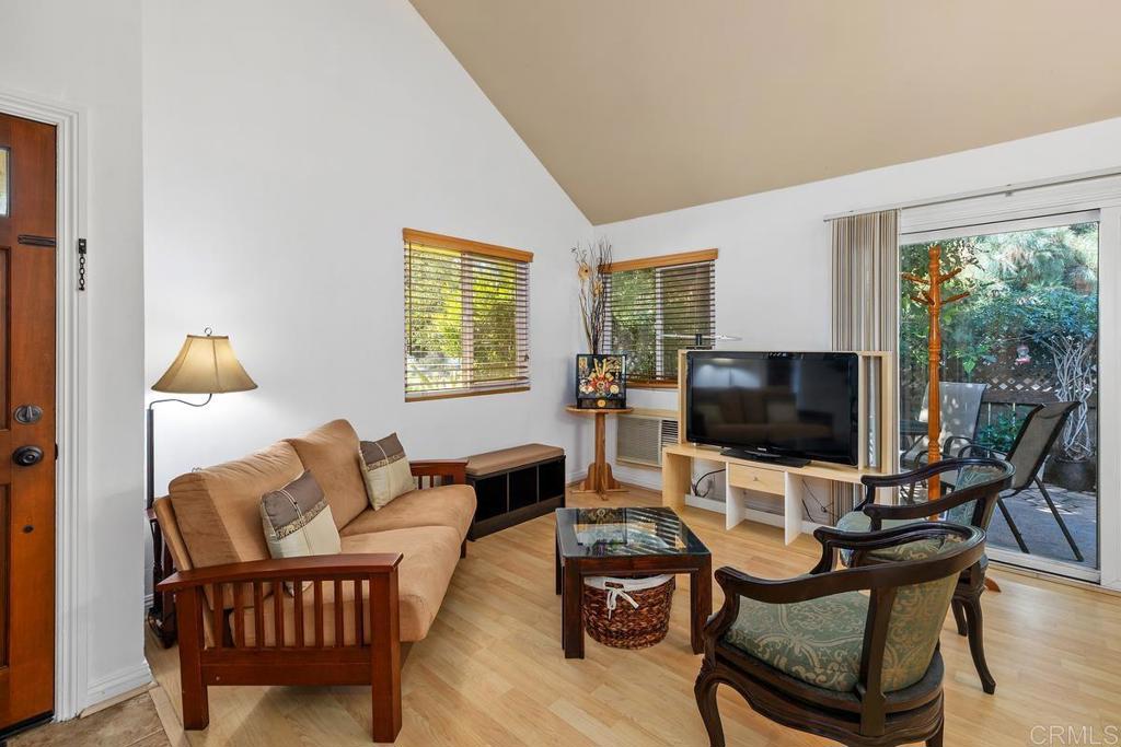 1145 Helix Street, Unit 1 Spring Valley, CA 91977 - Photo 5 of 30 a living room with furniture and a flat screen tv
