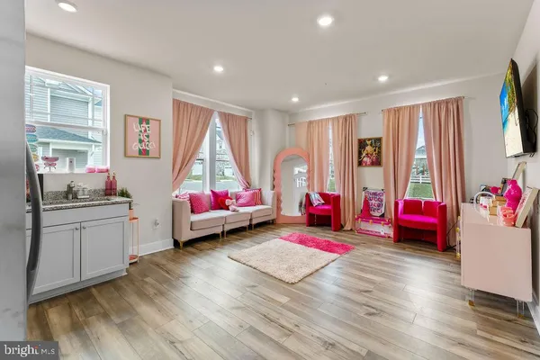 a bedroom with furniture and window