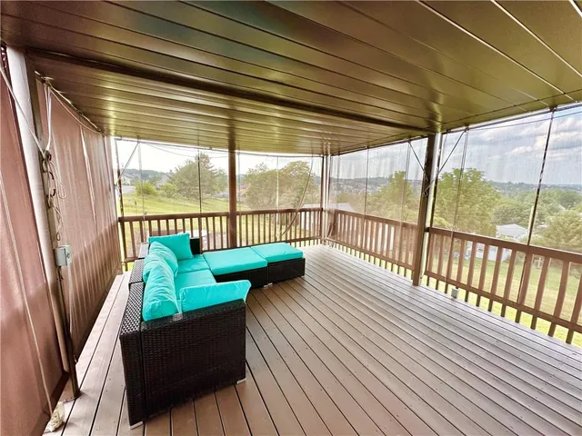 a view of balcony with couch