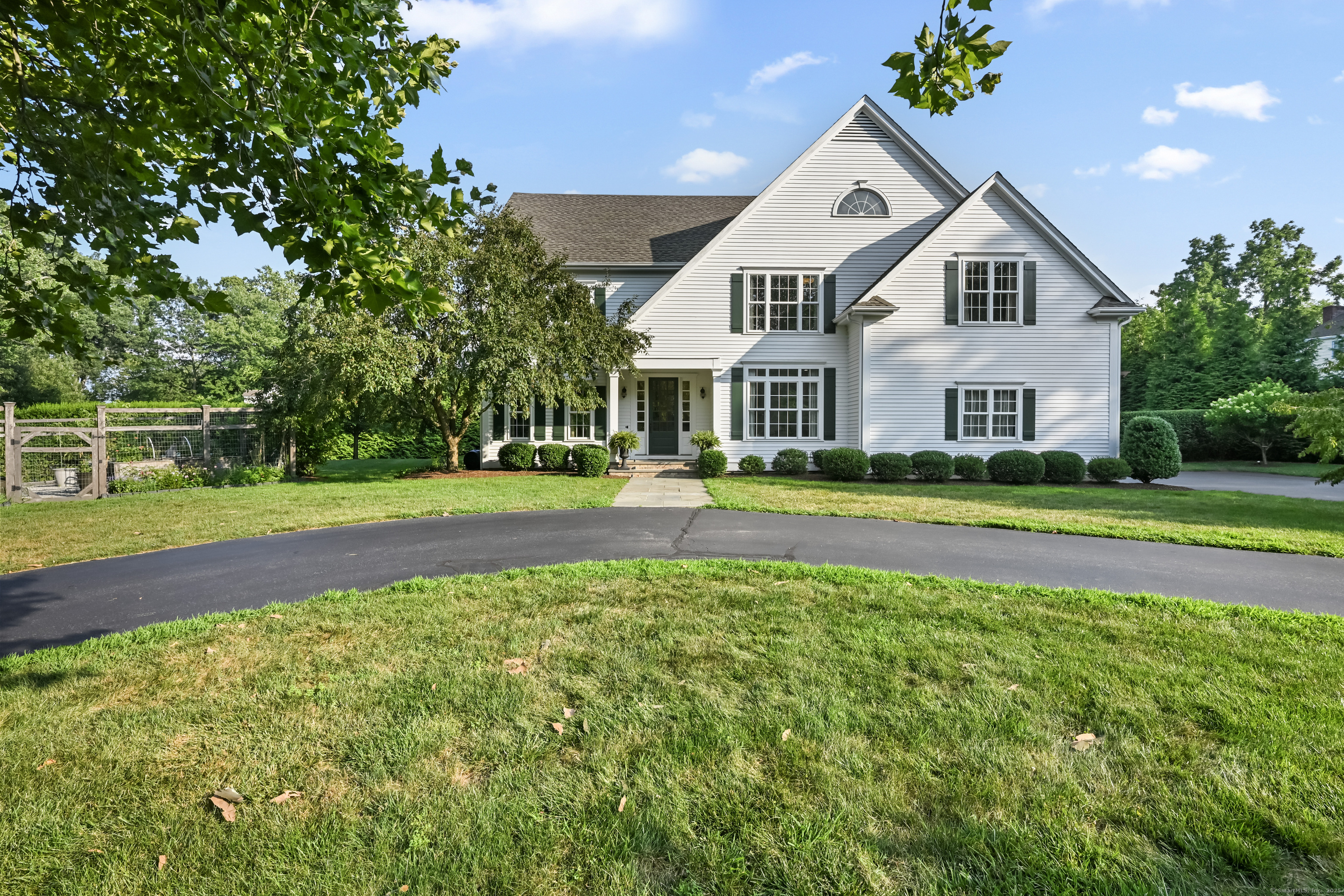 4 Golf View Drive Easton, CT 06612 - Photo 1 of 1 a front view of a house with a yard