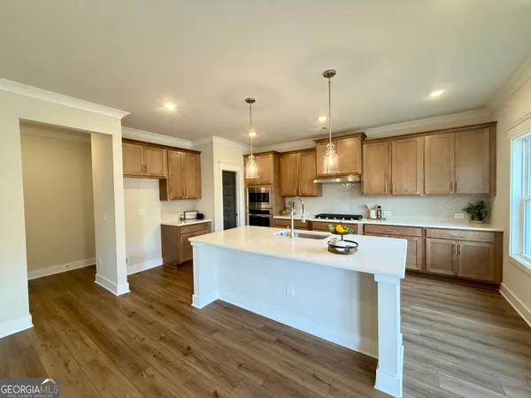a aerial view of a house with swimming pool