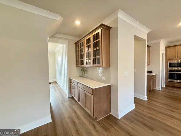 a view of a lake with houses in front of it