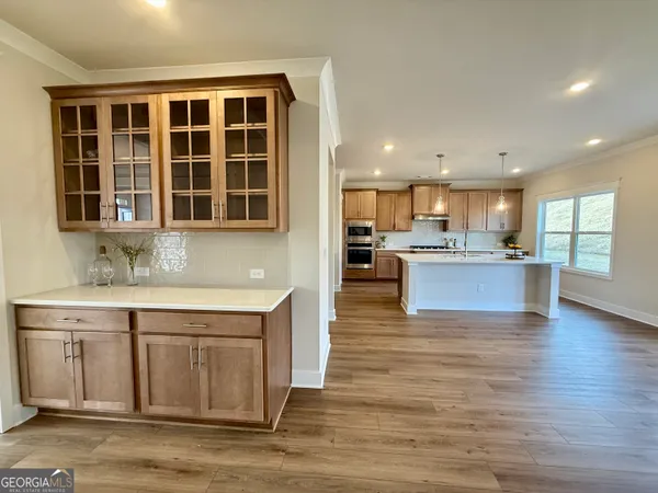 a view of a swimming pool with a yard