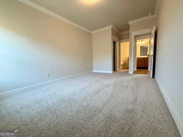 a view of a building with a window and a ceiling fan