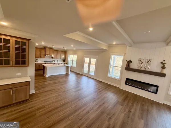 a view of a room with a large window