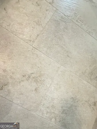 a view of a park with iron fence