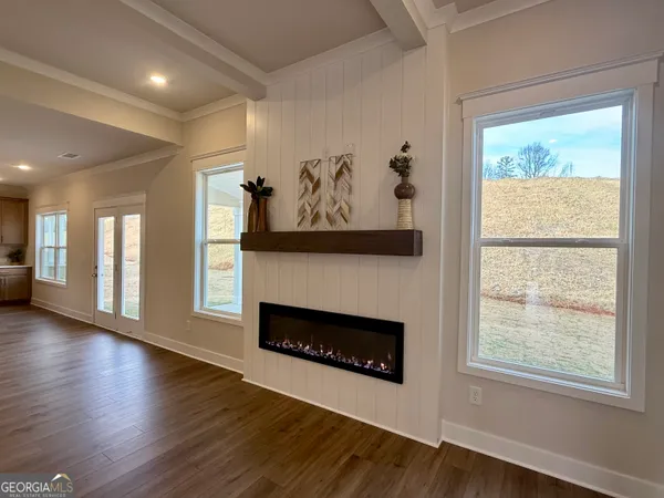 a bathroom with a sink a mirror and shower