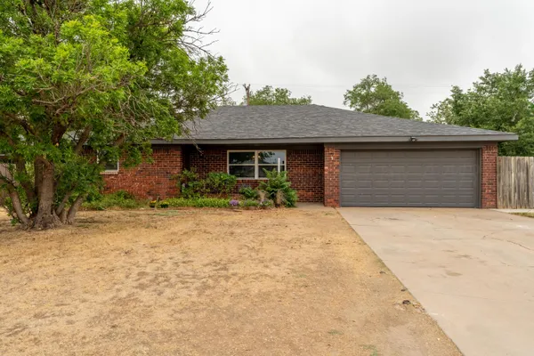 a front view of house with yard