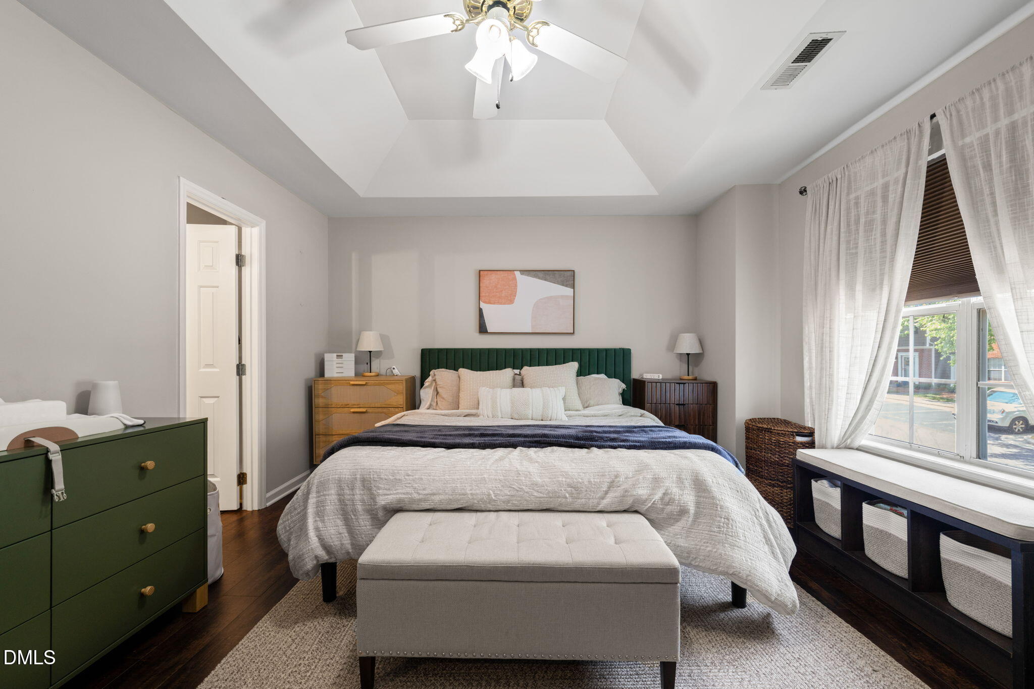 4323 Pine Springs Court Raleigh, NC 27613 - Photo 25 of 38 a bedroom with a large bed and a window