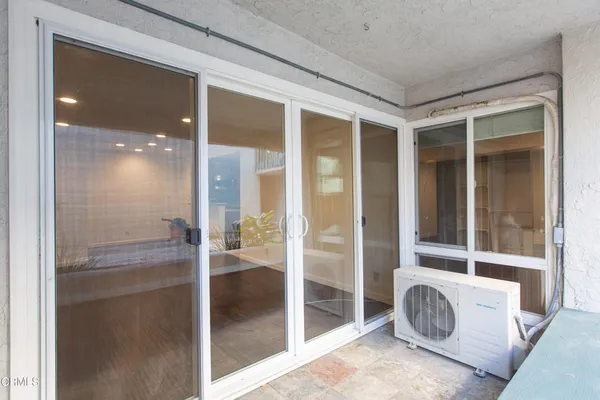 a bathroom with a tub and shower