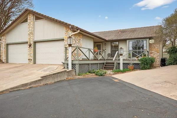 a view of a house with a street