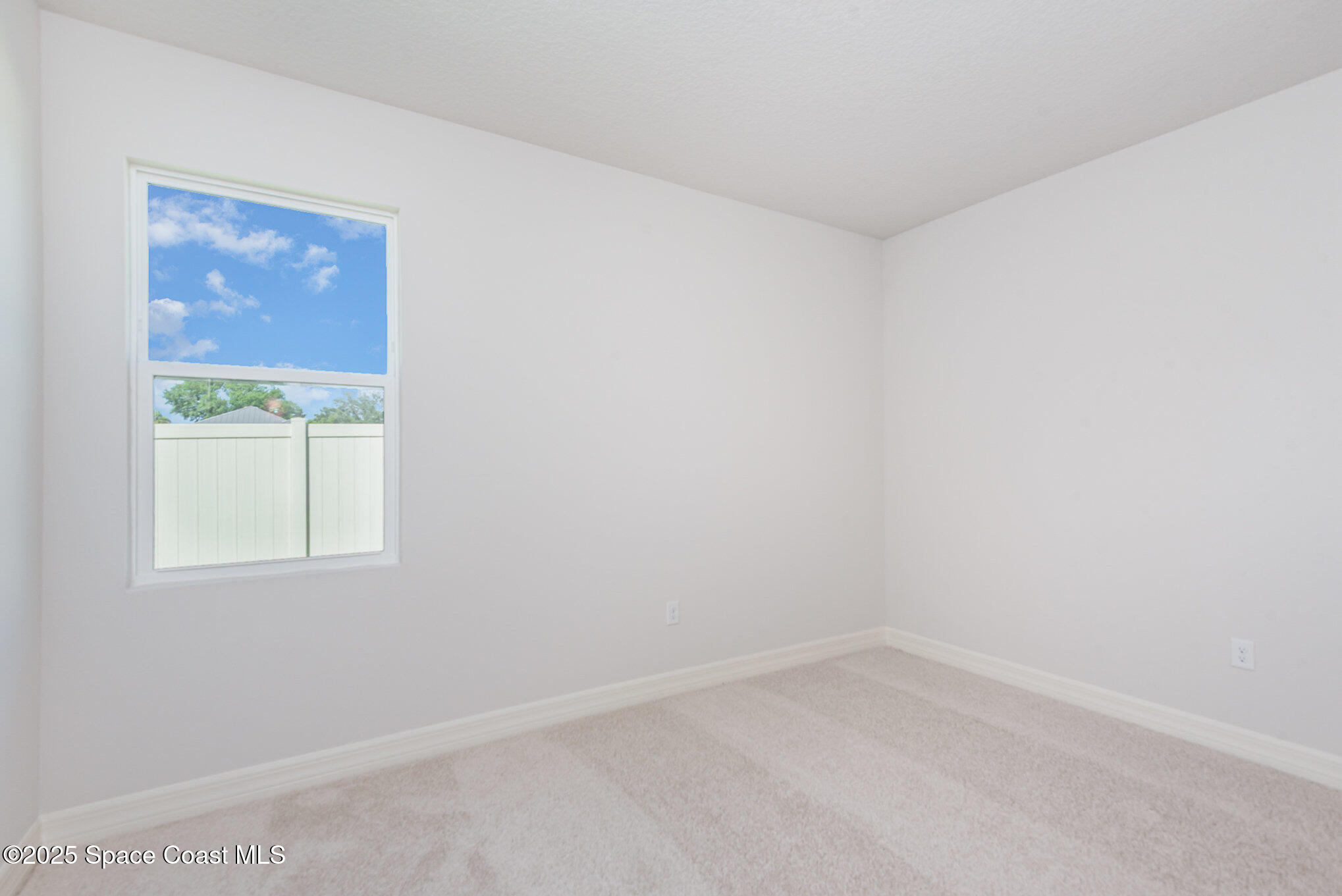 230 1st Street Cocoa, FL 32922 - Photo 19 of 34 an empty room with a window