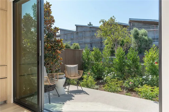 a kitchen with sink stove and cabinets