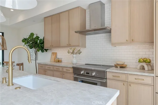 a bathroom with a sink mirror and vanity