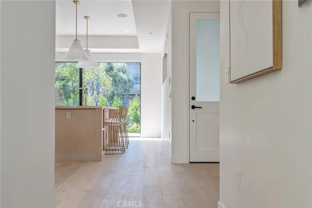 a spacious bedroom with a bed and a couch