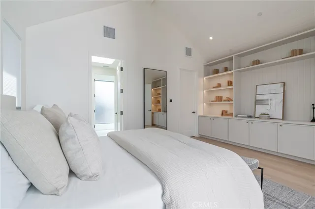 a view of a workspace with a table and chair in a room