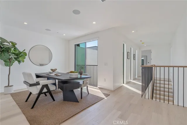a picture of a room with a white wall and a dishwasher