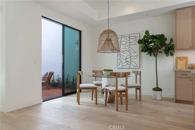 front view of a house with a tree