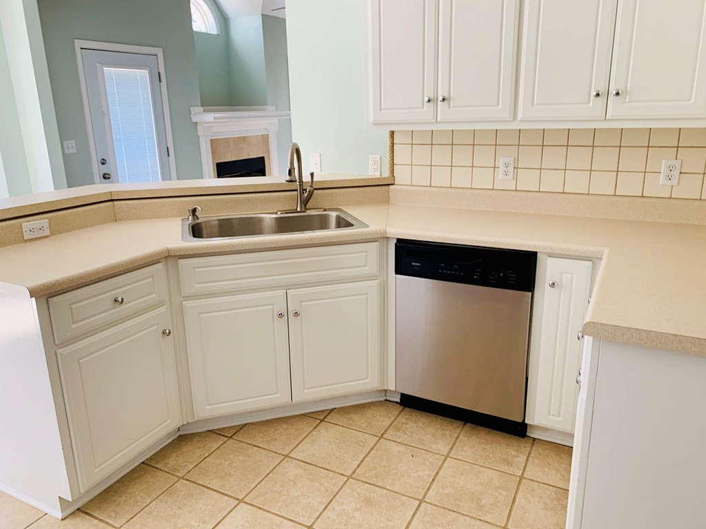 164 Hamelin Road Aiken, SC 29805 - Photo 26 of 38 a kitchen with white cabinets and sink