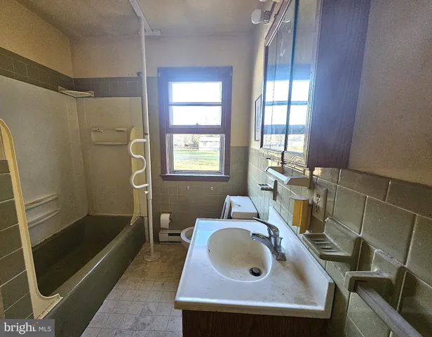 a bathroom with a sink and a bathtub