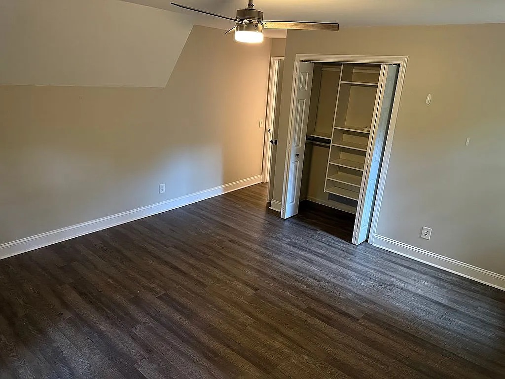 315 Rock Creek Road Clemson, SC 29631 - Photo 14 of 18 Gleaming wood-look floors complement the clean lines and angled ceiling of this versatile room.