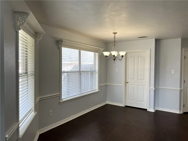 a storage room with wooden floor