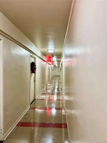 a kitchen with a stove a sink and a refrigerator