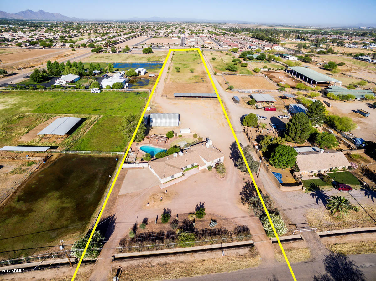 41568 North Rattlesnake Road San Tan Valley, AZ 85140 - Photo 28 of 32 an aerial view of a house with a yard