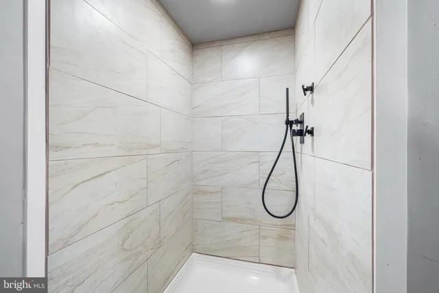 a bathroom with a sink a toilet and window