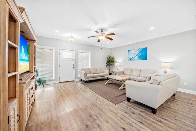 a bathroom with a double vanity sink mirror double and toilet