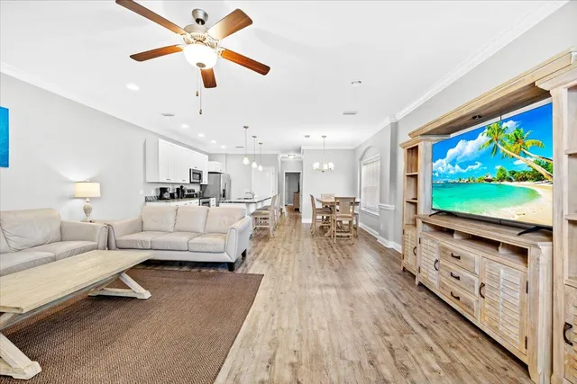 a living room with furniture and a rug