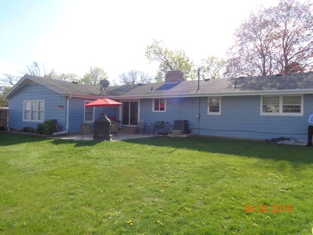 1001 North 3rd Street Rochelle, IL 61068 - Photo 12 of 12 a view of a house with a garden