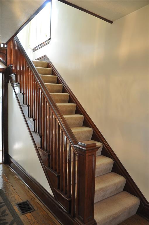 343 Roosevelt Road Pittsburgh, PA 15237 - Photo 15 of 25 Large entry way, light, bright and spacious. Original wooden banister.