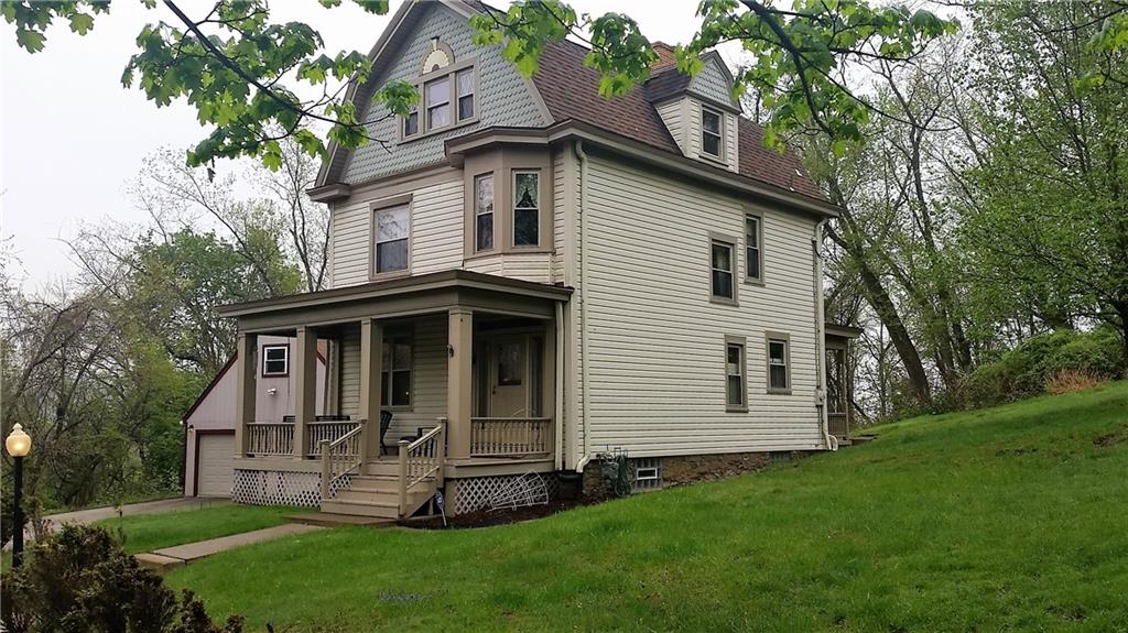 343 Roosevelt Road Pittsburgh, PA 15237 - Photo 3 of 25 Front and side view, with detached garage off to the left.