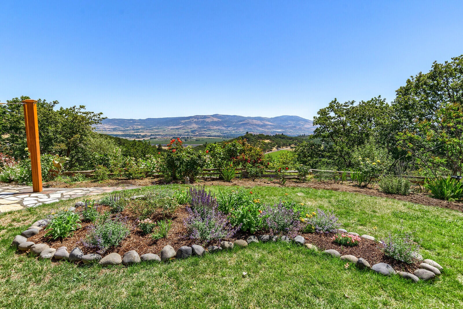 5196 Pioneer Road Medford, OR 97501 - Photo 44 of 94 East side flower bed.