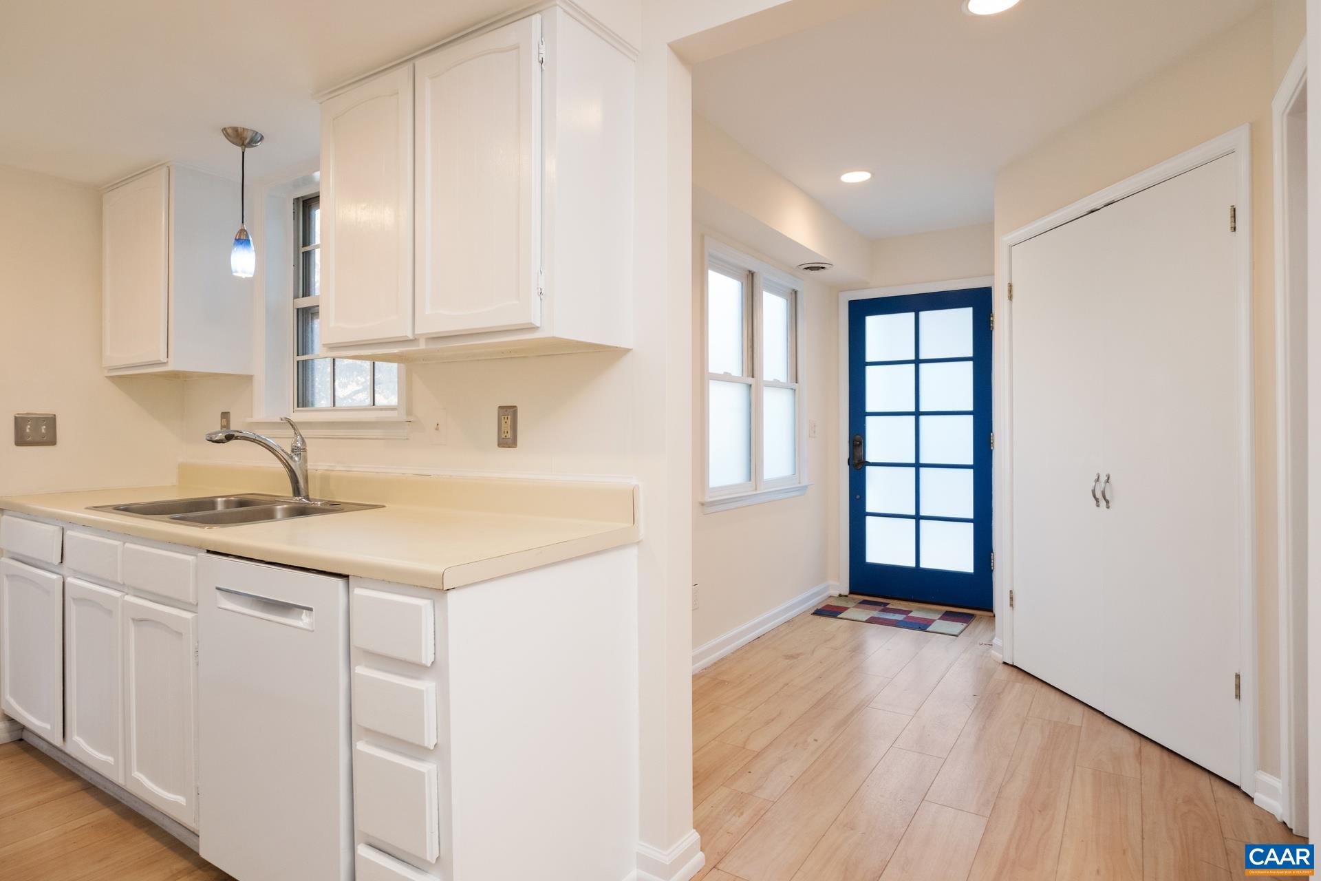 1115 Cottonwood Road Charlottesville, VA 22901 - Photo 11 of 41 a kitchen with a sink window and cabinets