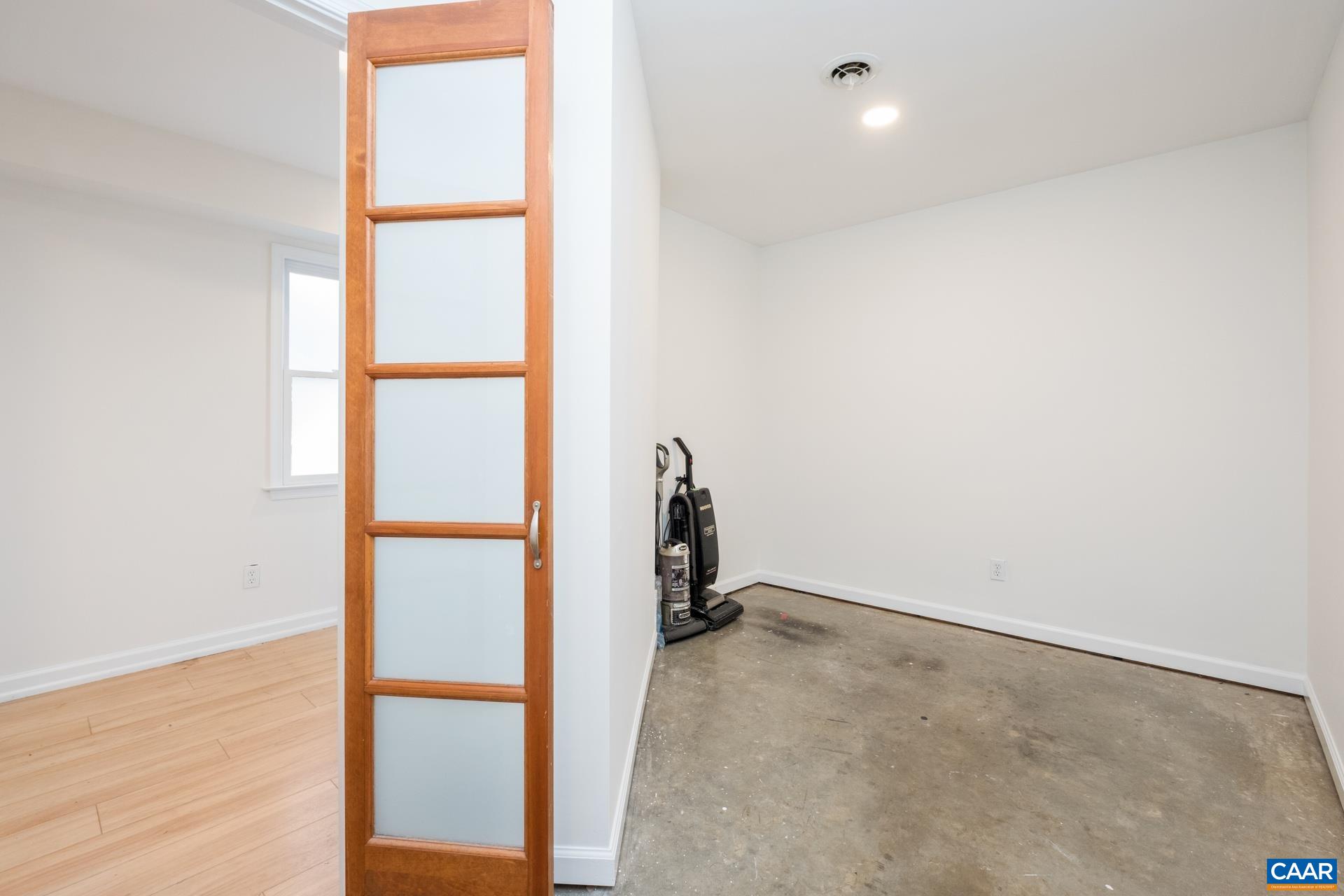 1115 Cottonwood Road Charlottesville, VA 22901 - Photo 12 of 41 wooden floor in an empty room with a window