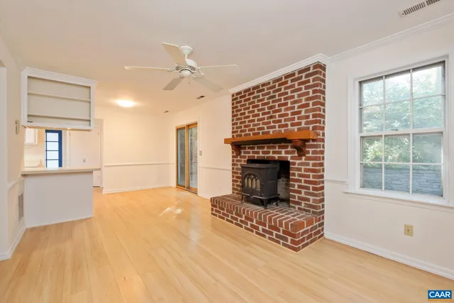 a bedroom with a bed and a mirror