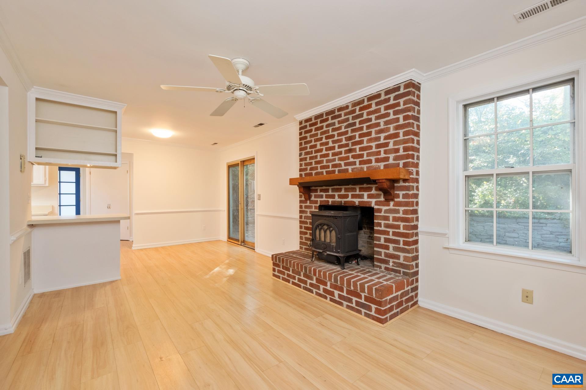 1115 Cottonwood Road Charlottesville, VA 22901 - Photo 15 of 41 a living room with furniture and a fireplace