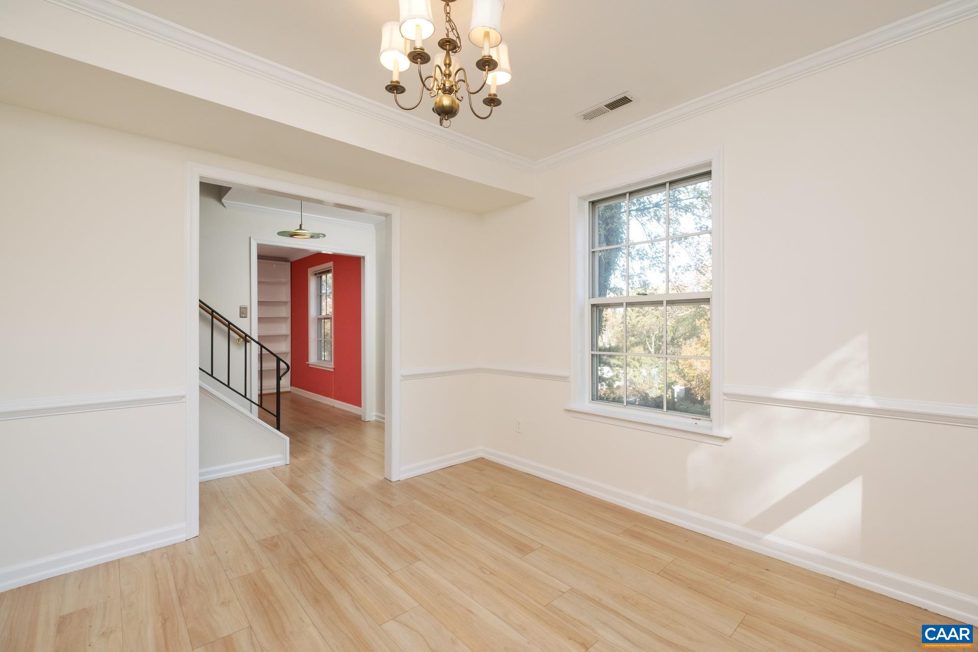 1115 Cottonwood Road Charlottesville, VA 22901 - Photo 18 of 41 wooden floor in an empty room with a window