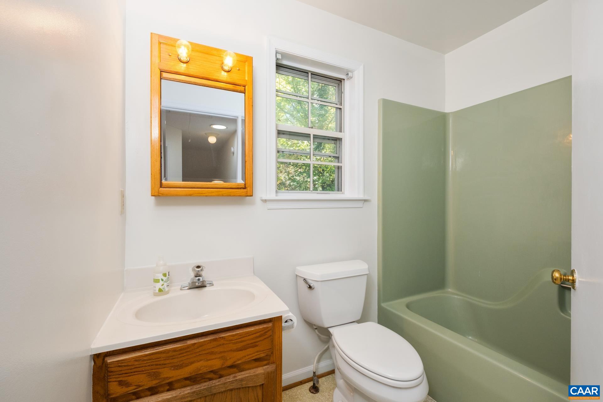 1115 Cottonwood Road Charlottesville, VA 22901 - Photo 26 of 41 a bathroom with a sink toilet and shower