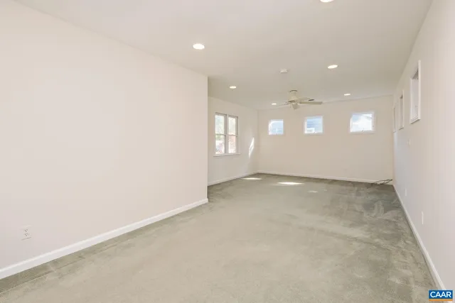 a view of a chair and table in backyard