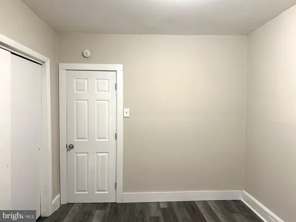 a view of small space with wooden floor