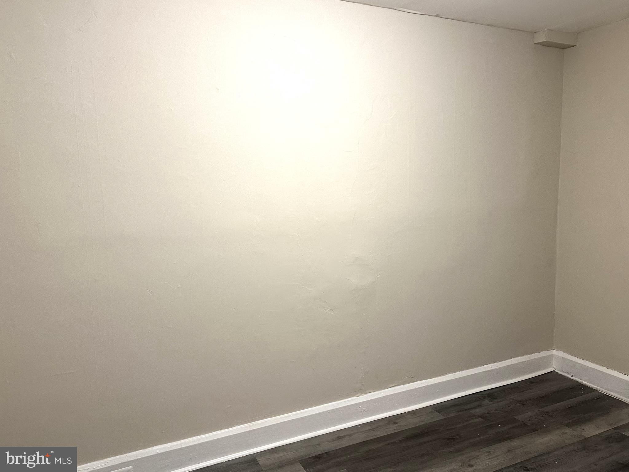 425 Highland Avenue, Unit A Chester, PA 19013 - Photo 4 of 24 a view of small space with wooden floor