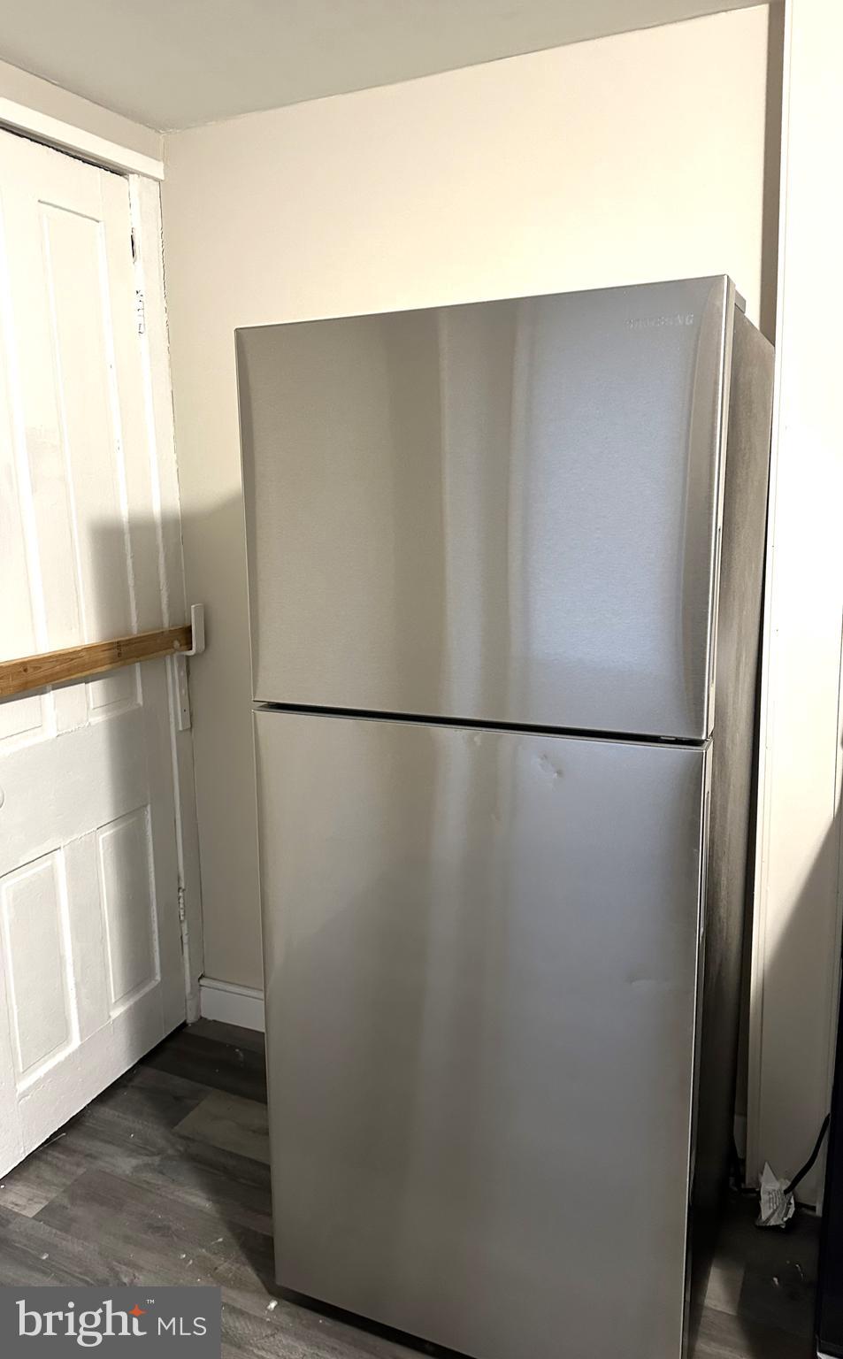 425 Highland Avenue, Unit A Chester, PA 19013 - Photo 6 of 24 a close view of a refrigerator in kitchen