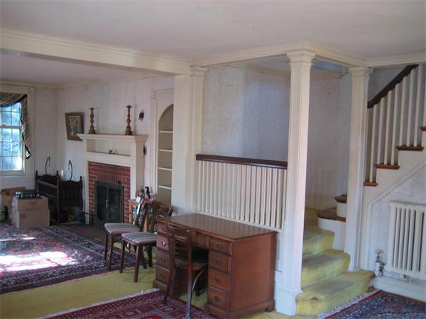 36 Great Road Maynard, MA 01754 - Photo 12 of 17 a living room with furniture and a fireplace