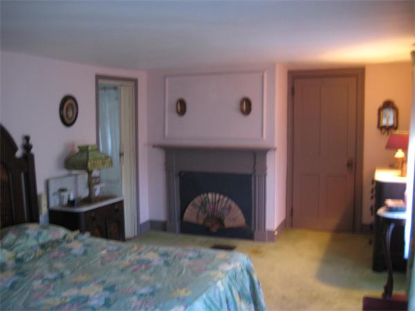 36 Great Road Maynard, MA 01754 - Photo 13 of 17 a living room with furniture and a fireplace
