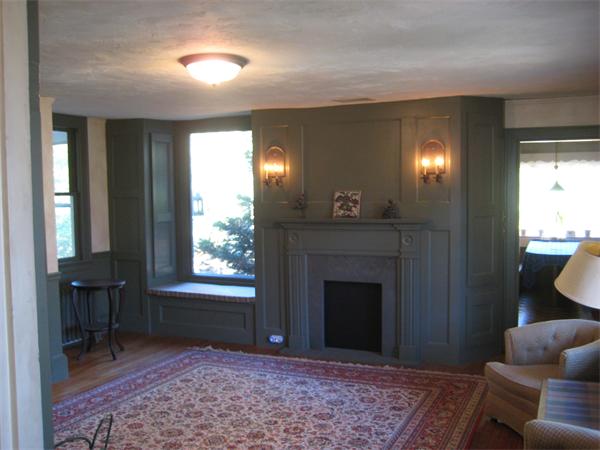 36 Great Road Maynard, MA 01754 - Photo 10 of 17 a living room with furniture and a fireplace
