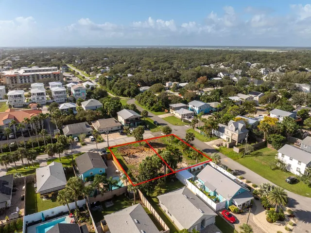 an aerial view of a city with lots of residential buildings