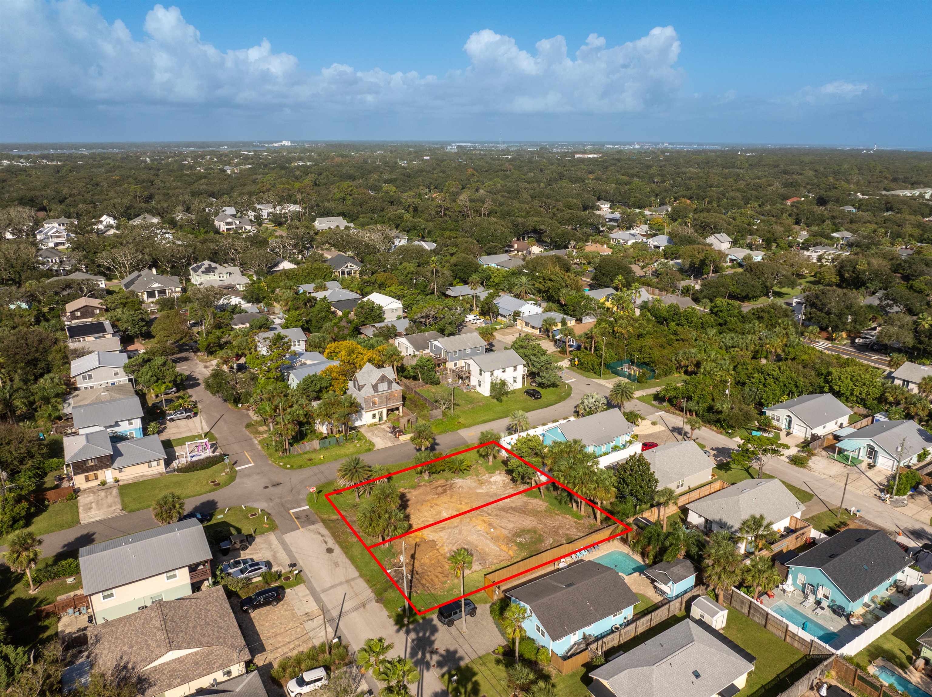 118 9th Street St. Augustine, FL 32080 - Photo 8 of 10 an aerial view of residential houses with outdoor space and mountain view in back